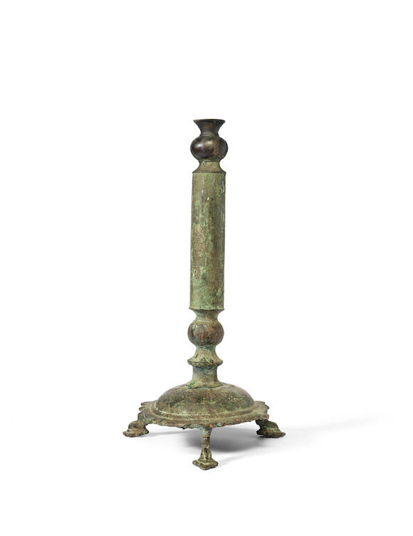 Bonhams A Khorasan bronze lamp stand 12th/13th century