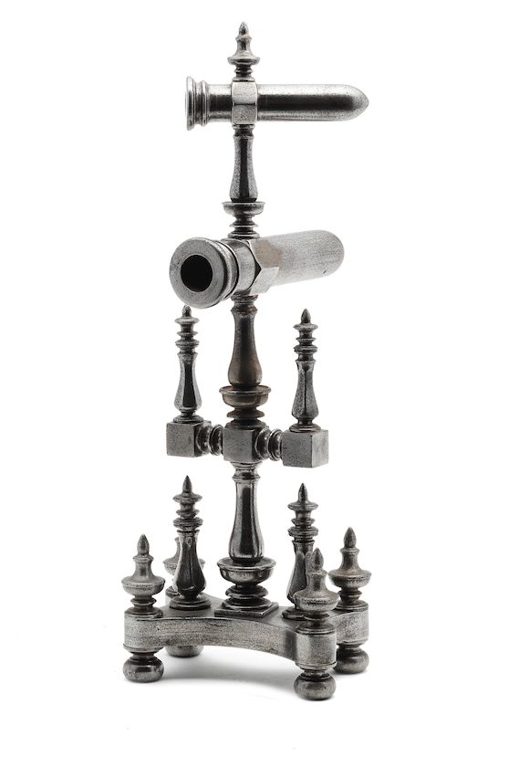 Bonhams A highly decorative cast iron double goffering iron, British