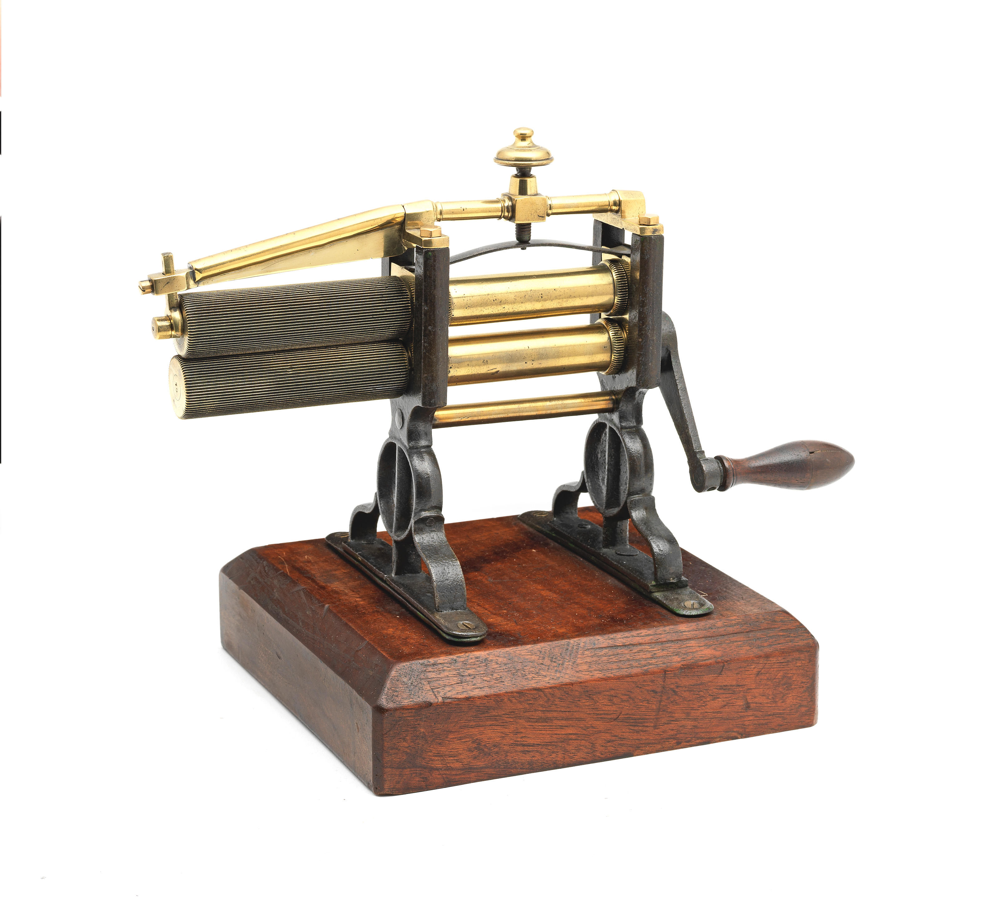A brass and iron crimping machine, English, circa 1840
