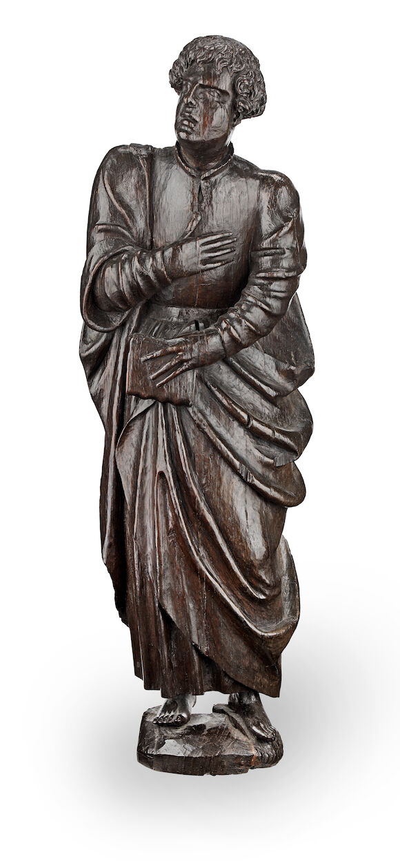 Bonhams : A 17th century carved oak figure of a male saint or doctor of ...