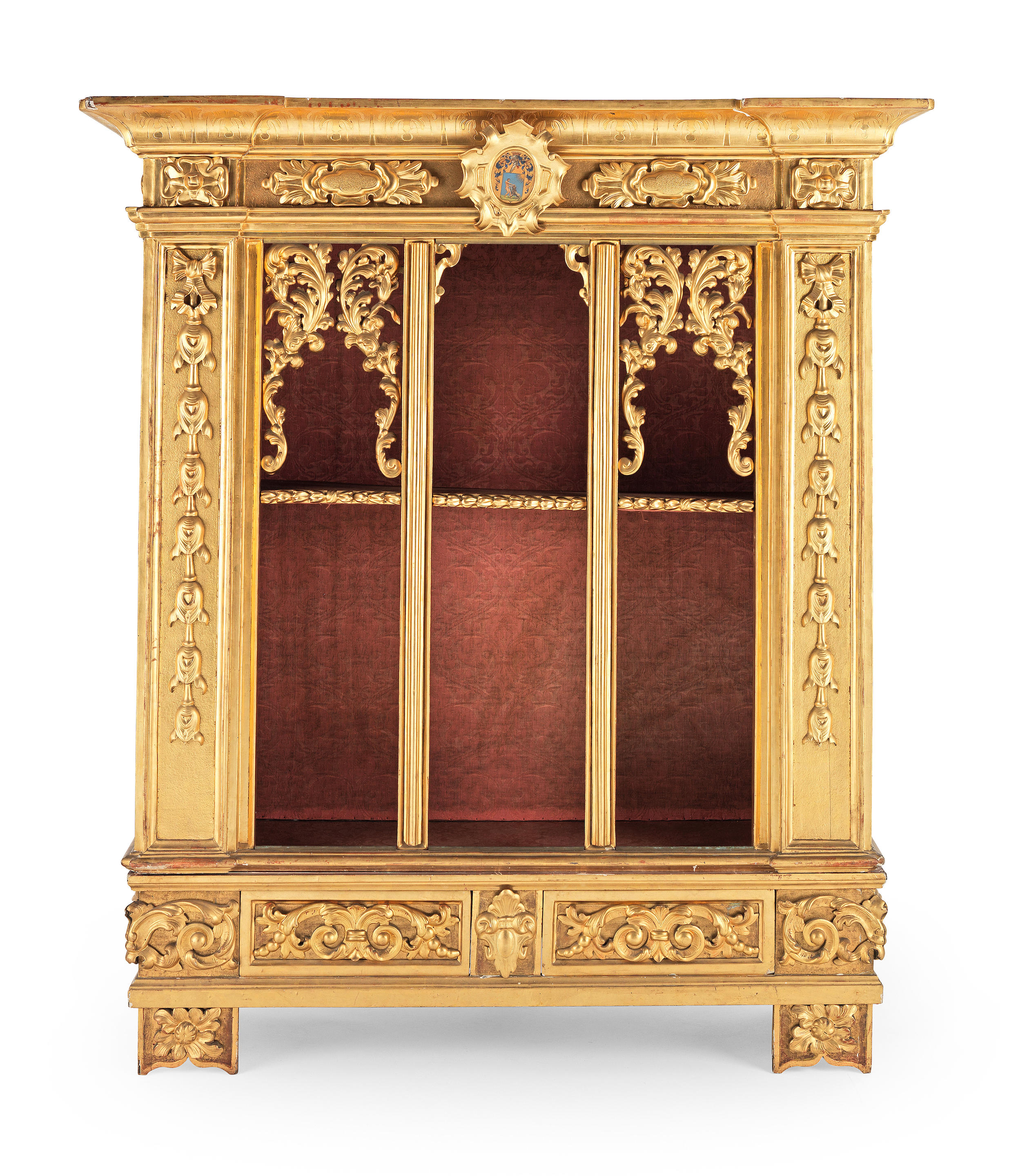 An Italian second quarter 19th century giltwood and gilt gesso display cabinet