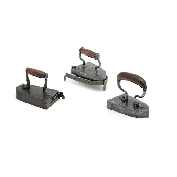 Bonhams Three 19th century wrought iron box irons, French (5)