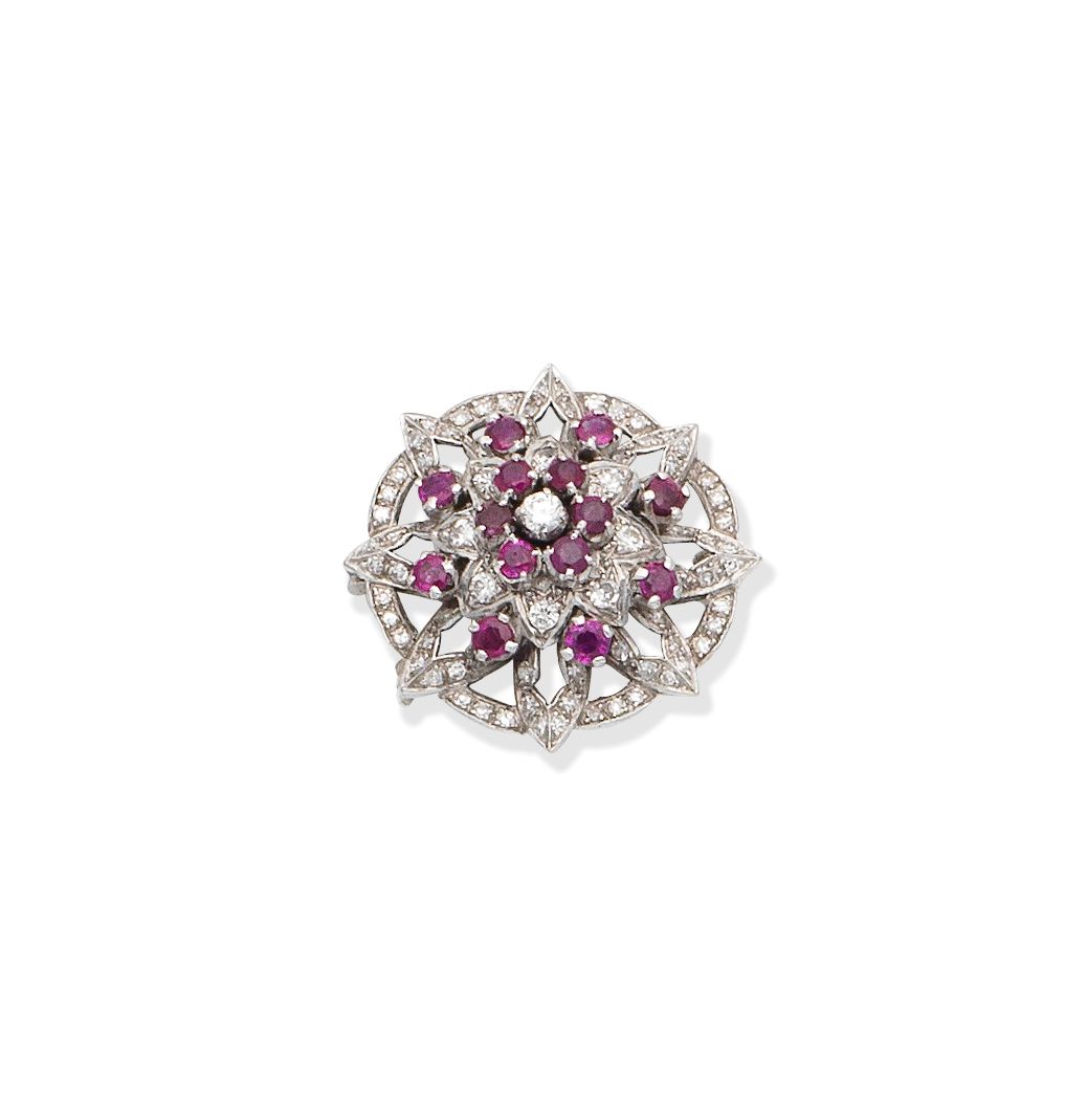 A ruby and diamond flower brooch