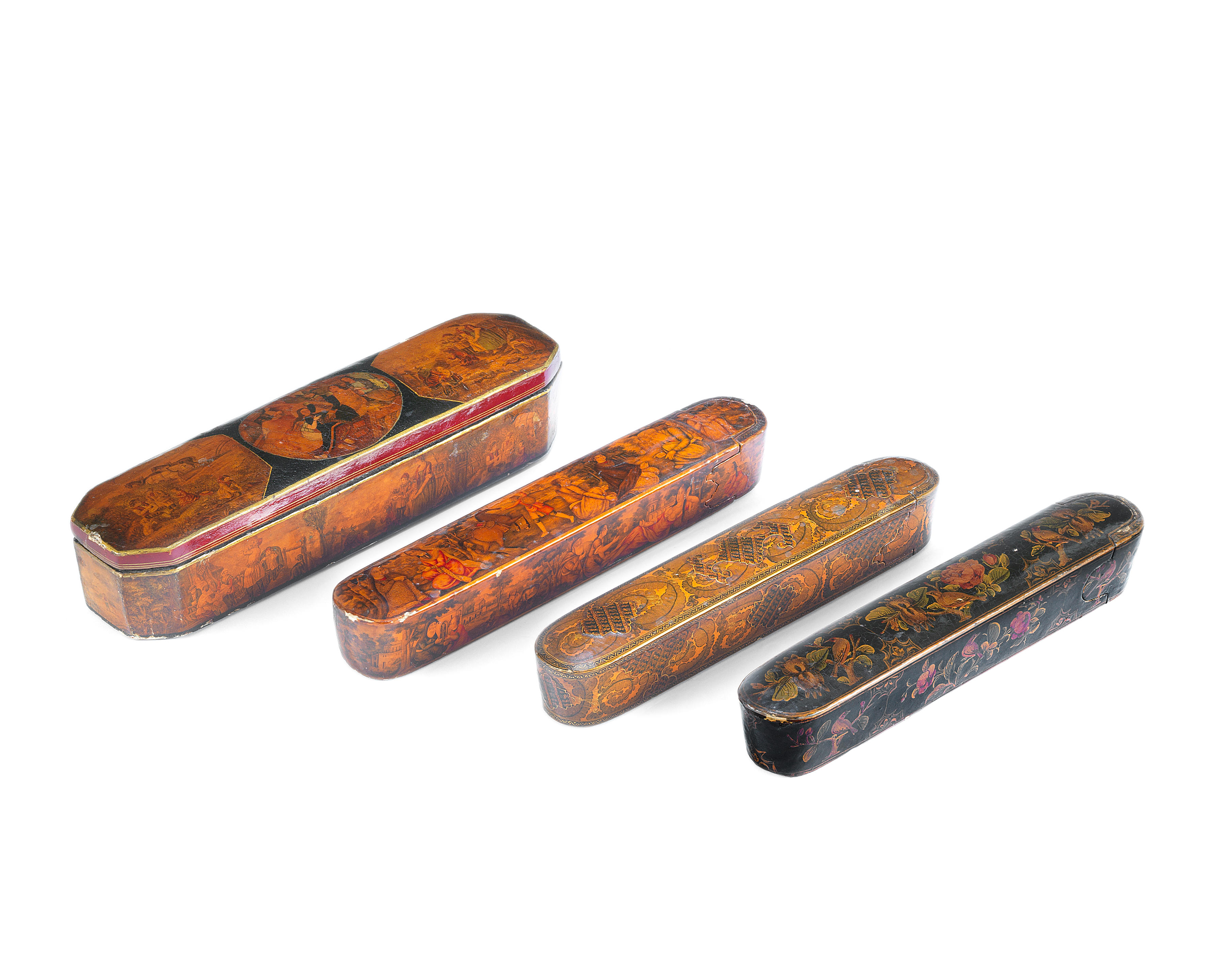 Four Qajar lacquer penboxes (qalamdan)