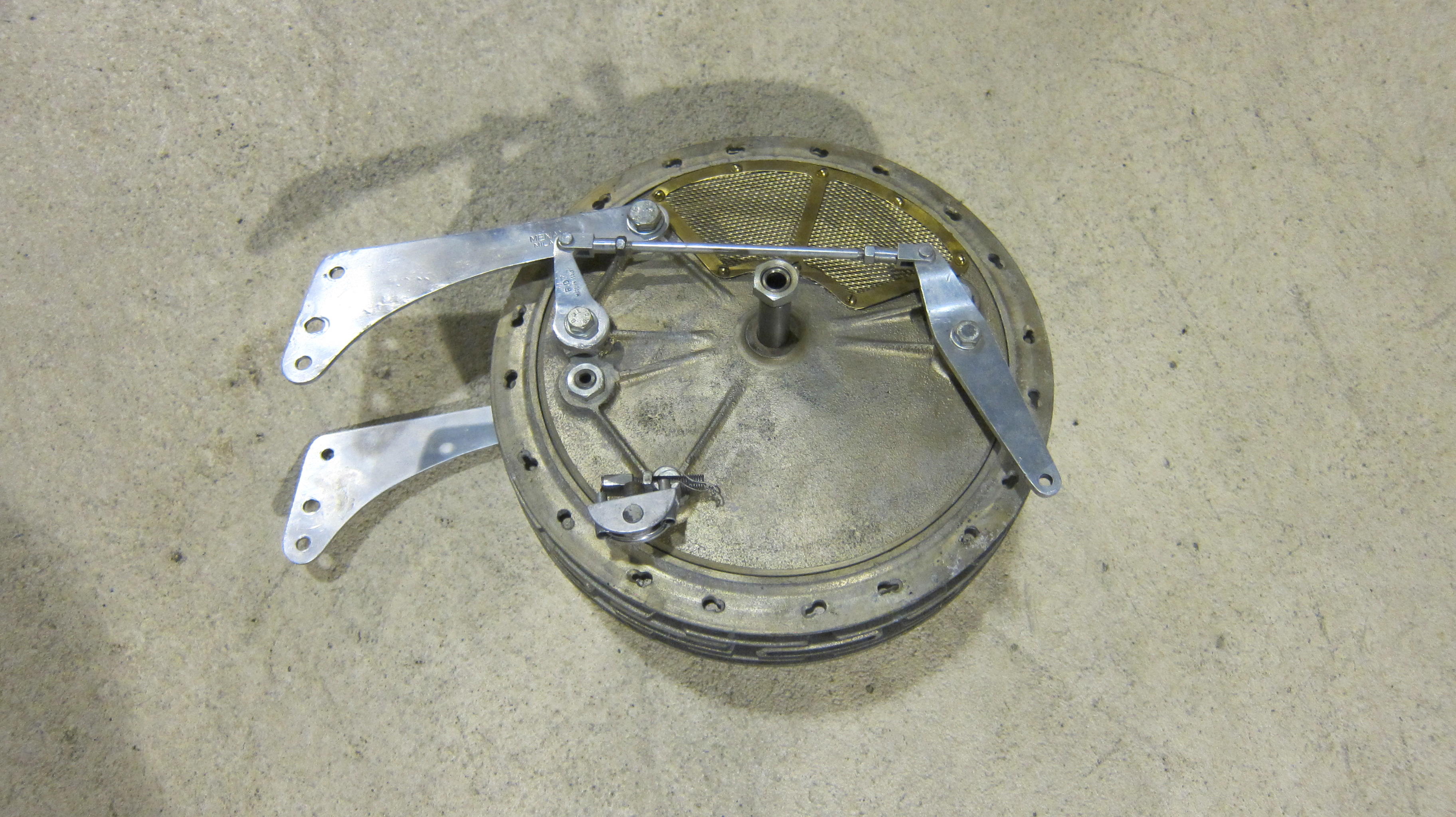 An unidentified believed racing motorcycle four leading shoe front hub