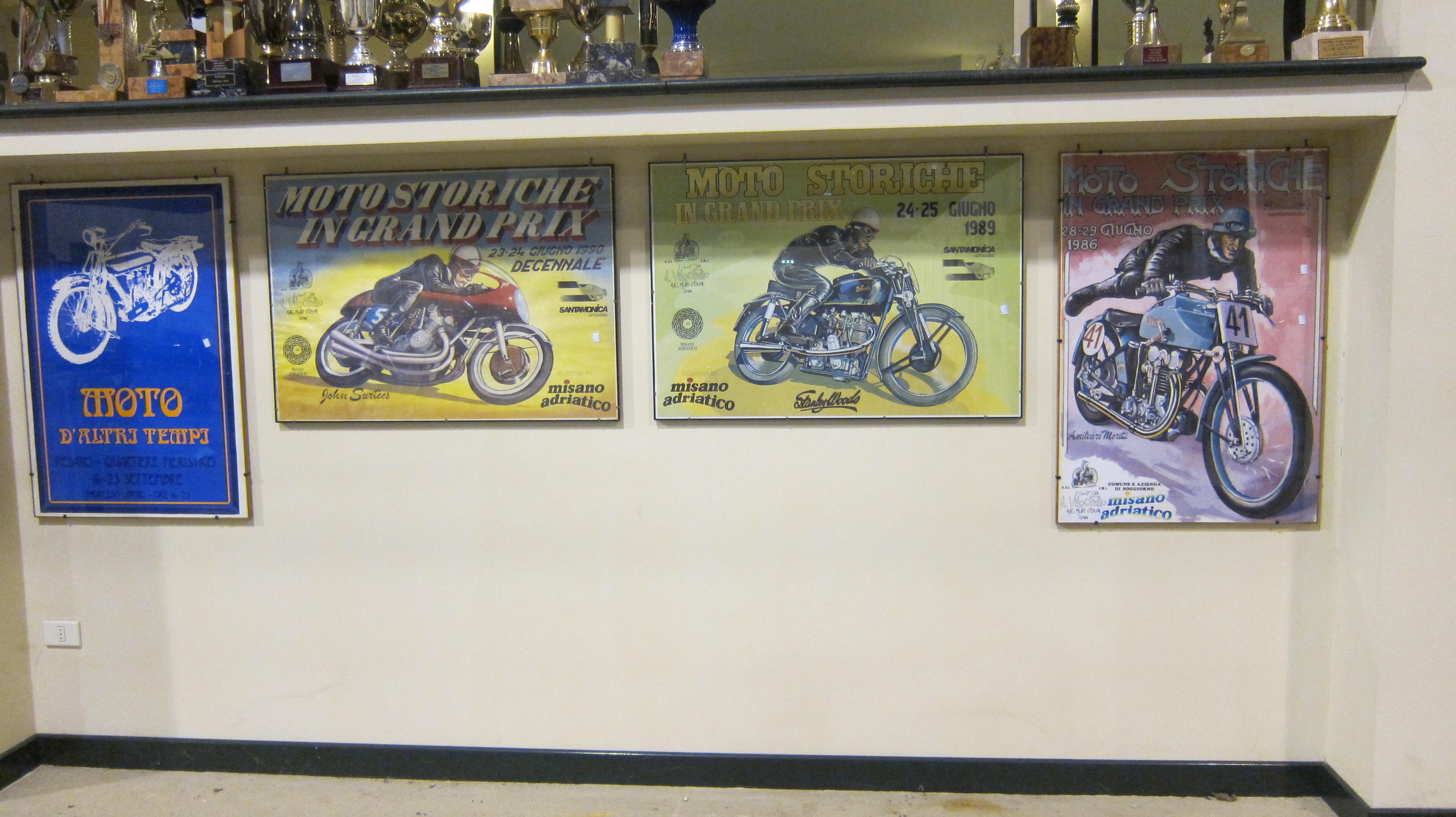 Four assorted motorcycle related posters