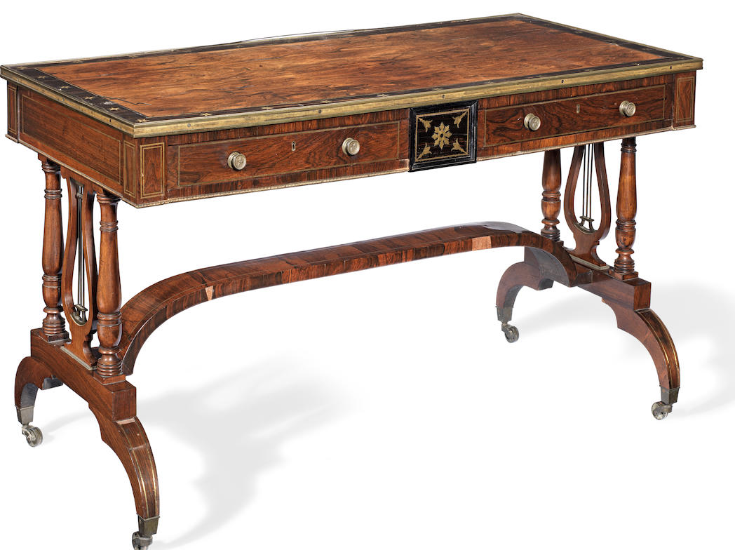 A Regency brass inlaid rosewood and calamander banded library table almost certainly by either John McLean or George Oakley