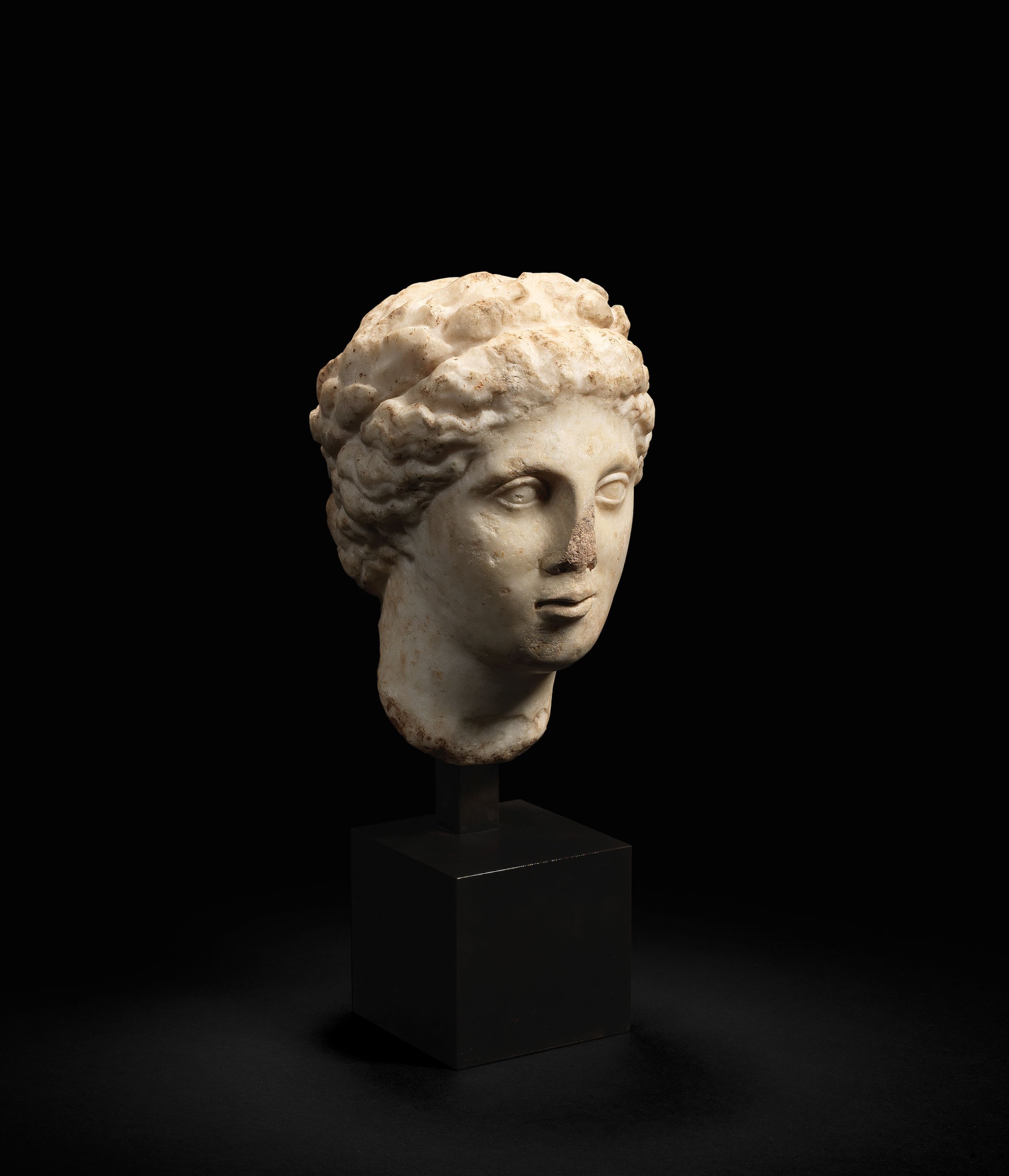 Bonhams A Roman marble head of a muse