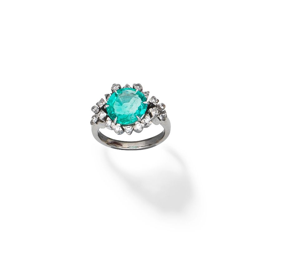 Emerald and diamond cluster ring