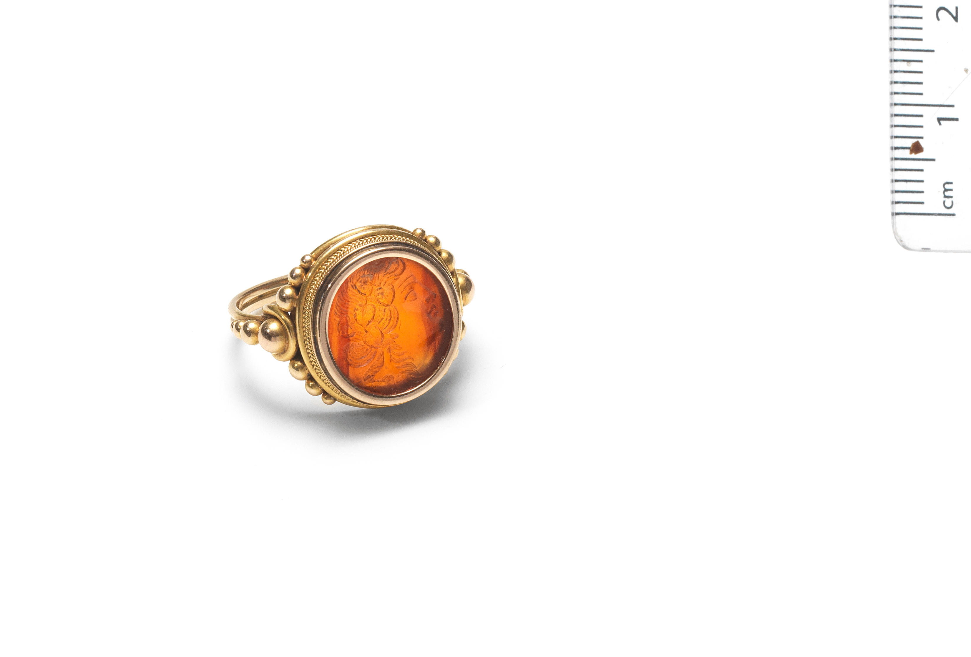 Bonhams : A carnelian intaglio ring of a head, 18th-19th century