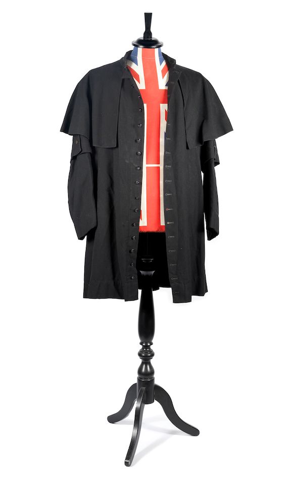 Bonhams Cream/Ginger Baker A Black Collarless Cassock Worn By Ginger