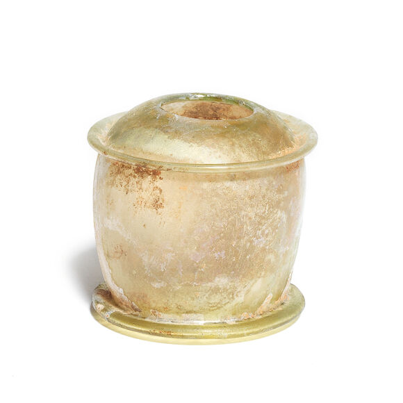Bonhams : A Roman yellow-green glass pyxis