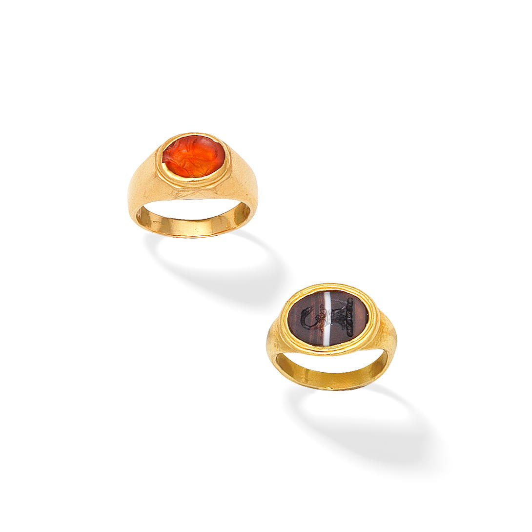 Bonhams : BANDED AGATE INTAGLIO RING AND BULGARI CARNELIAN INTAGLIO RING