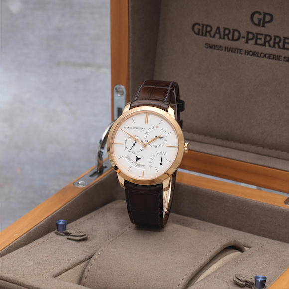 Bonhams GirardPerregaux. An 18K gold automatic annual calendar