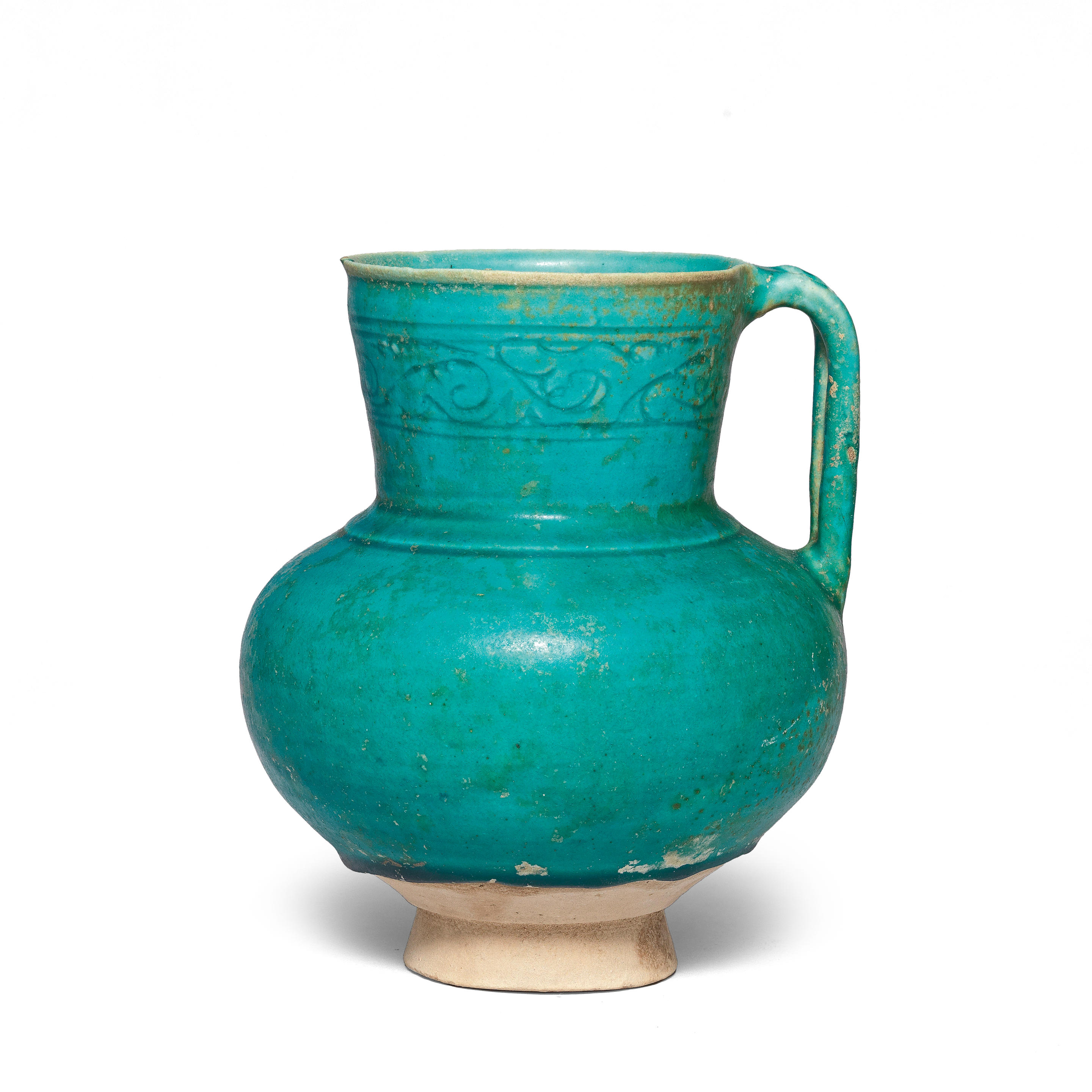 Bonhams A Kashan Monochrome Pottery Jug Persia 12th Century