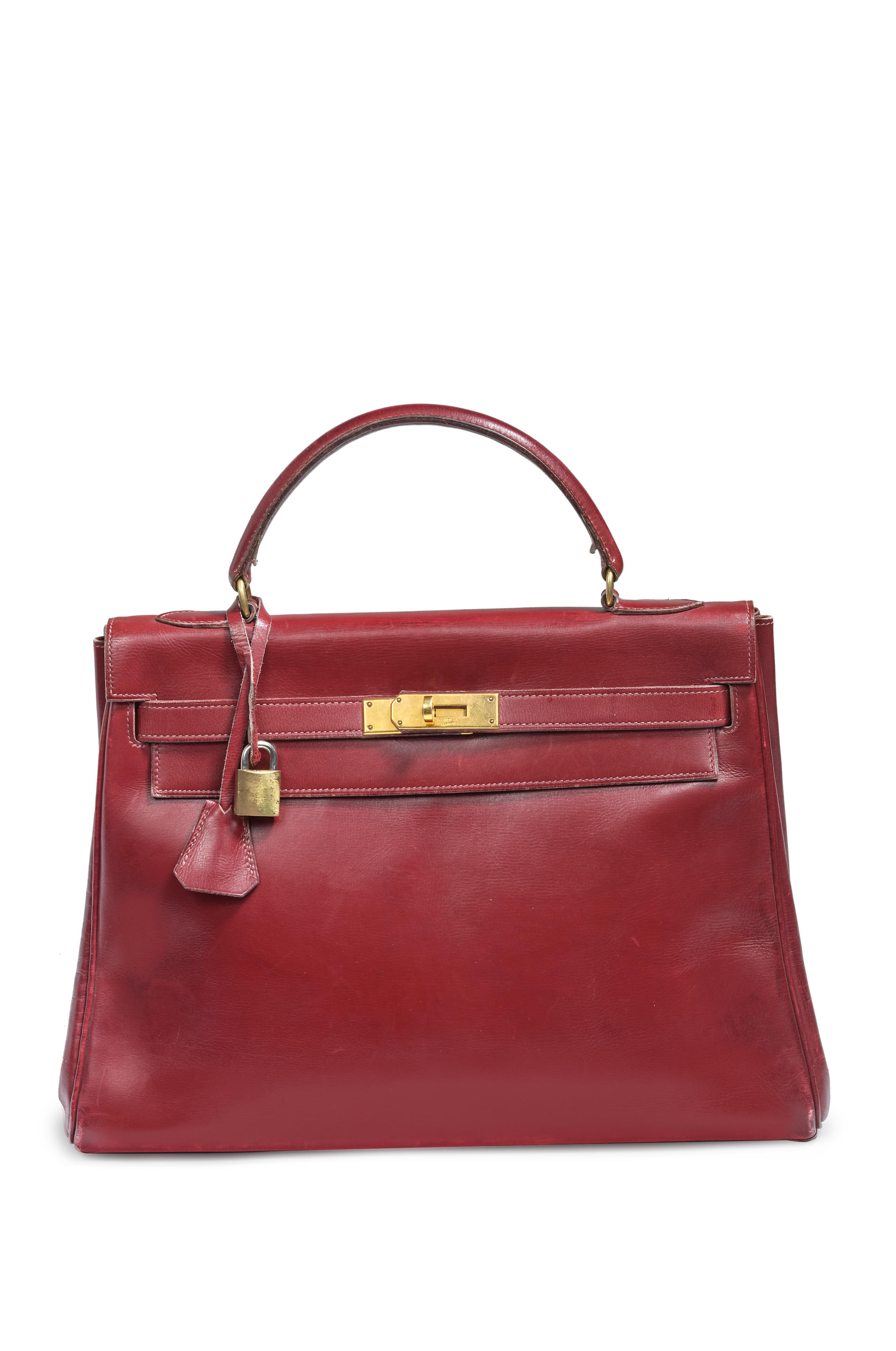 Bonhams : SAC A MAIN KELLY 32 EN BOX ROUGE Hermès, années 1960