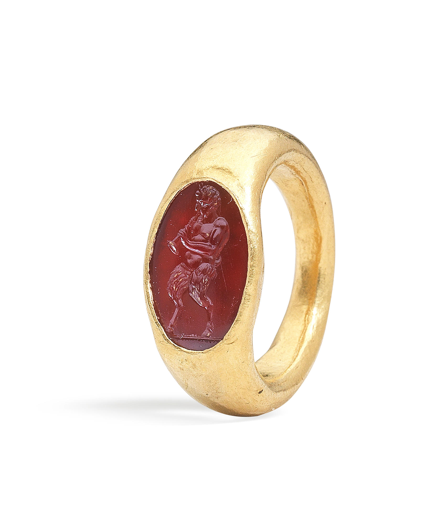 Bonhams : A Roman gold and carnelian intaglio ring with Pan