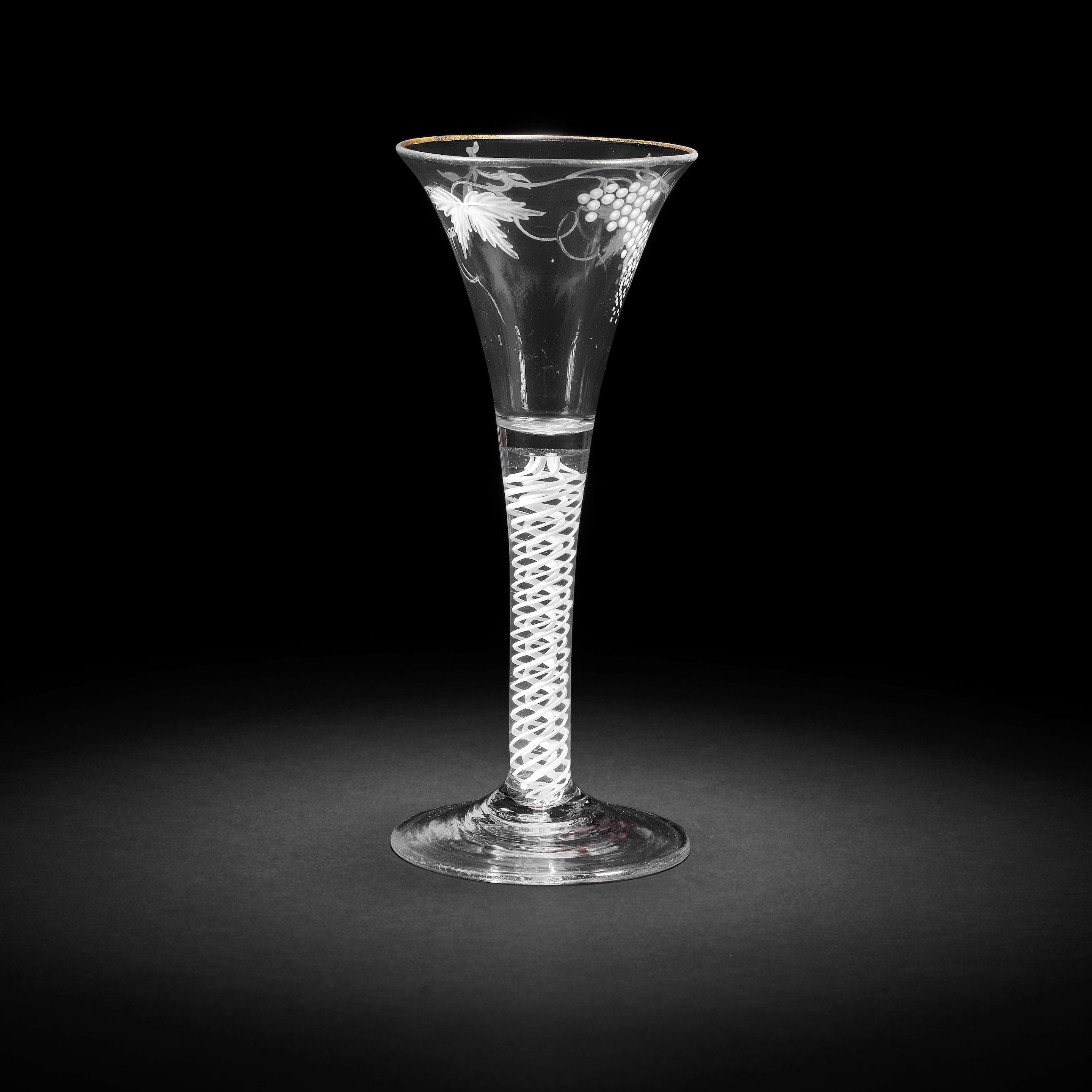 Bonhams A fine Beilby enamelled opaque twist wine glass, circa 1765