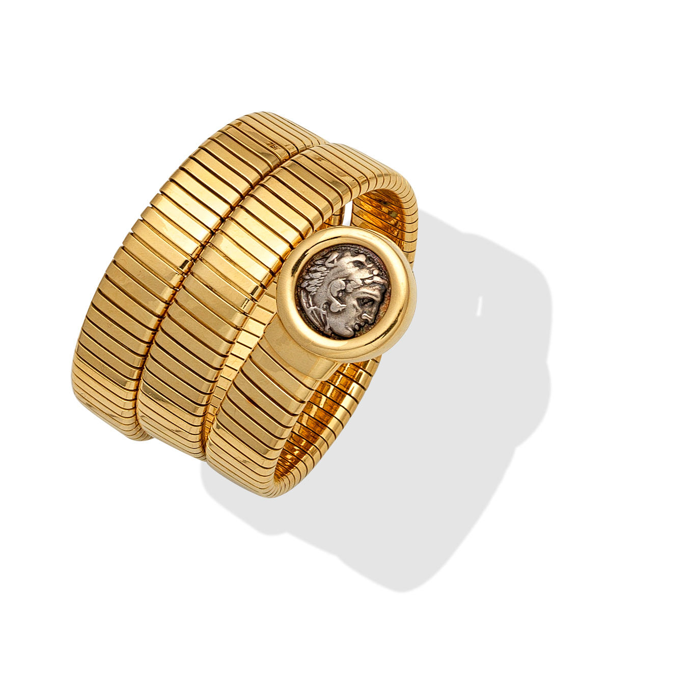 Bonhams : BULGARI 'GEMME NUMMARIE' TUBOGAS BANGLE,