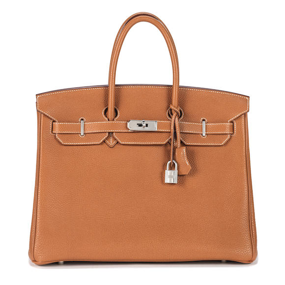 Bonhams : HERMÈS A GOLD TOGO BIRKIN 35 2007 (includes padlock, keys ...