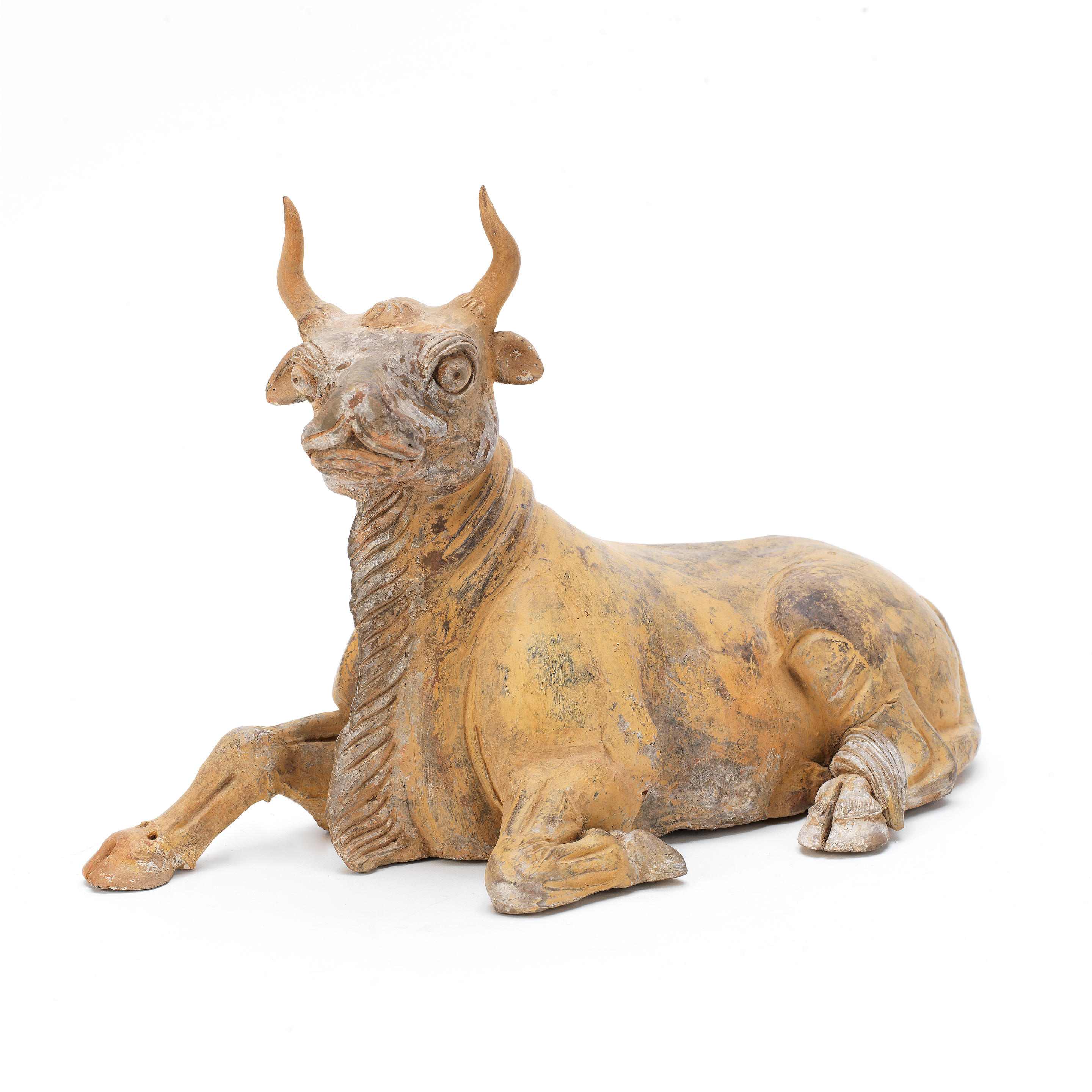 Bonhams : A GREY POTTERY MODEL OF A RECUMBENT OX Tang Dynasty