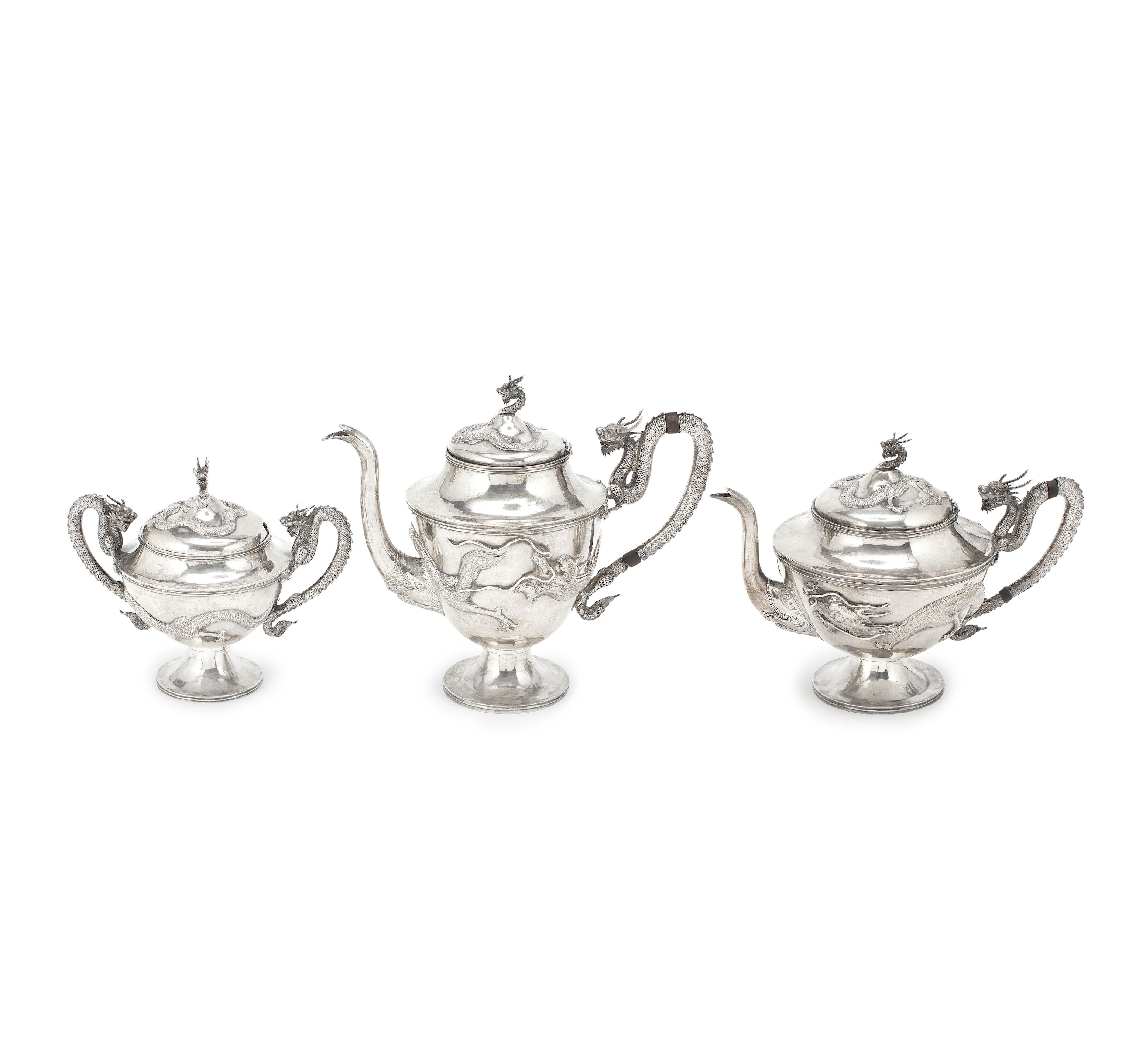Bonhams AN EXPORT THREEPIECE SILVER TEA SERVICE Mark of MH, Canton