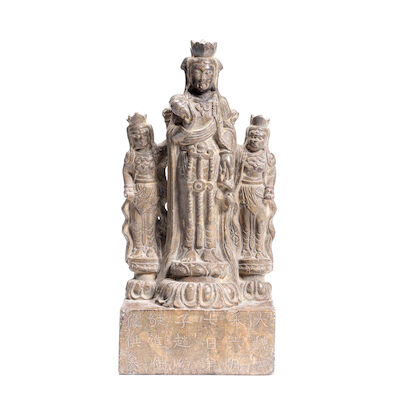 AN INSCRIBED STONE CARVING OF GUANYIN AND ACOLYTES Qing Dynasty