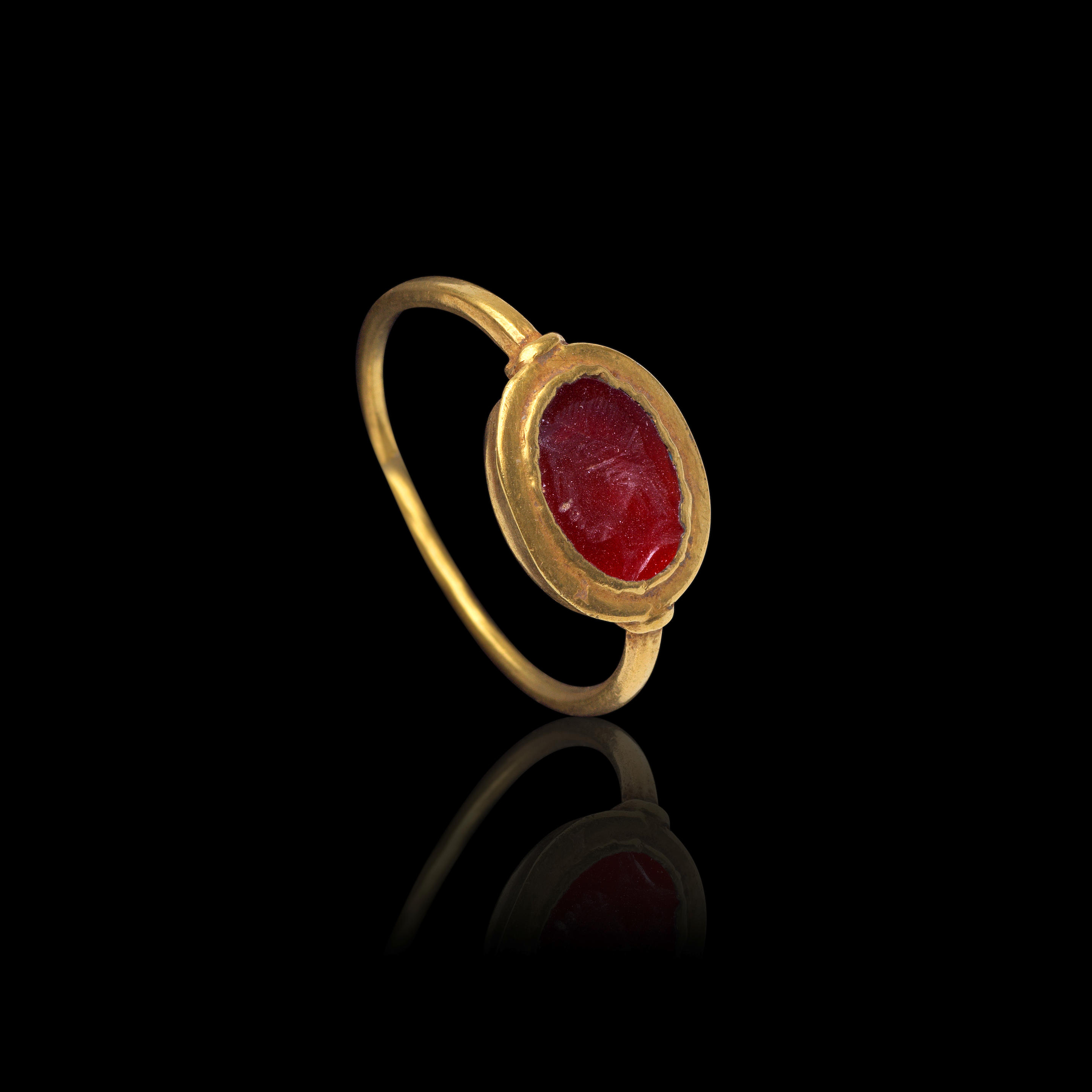 Bonhams : A ROMAN GOLD AND CARNELIAN INTAGLIO RING