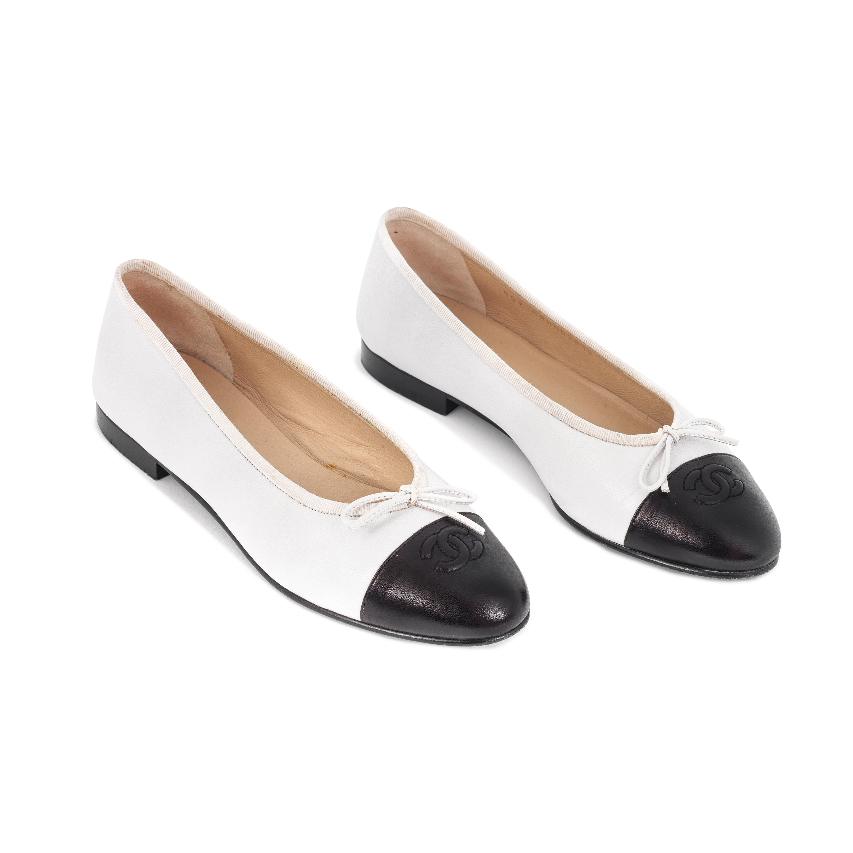 Bonhams : Chanel a Pair of Black and White Leather Ballet Flats (includes  box)