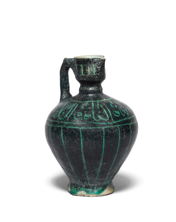 Bonhams A Kashan Silhouette Ware Pottery Ewer Persia 12th Century