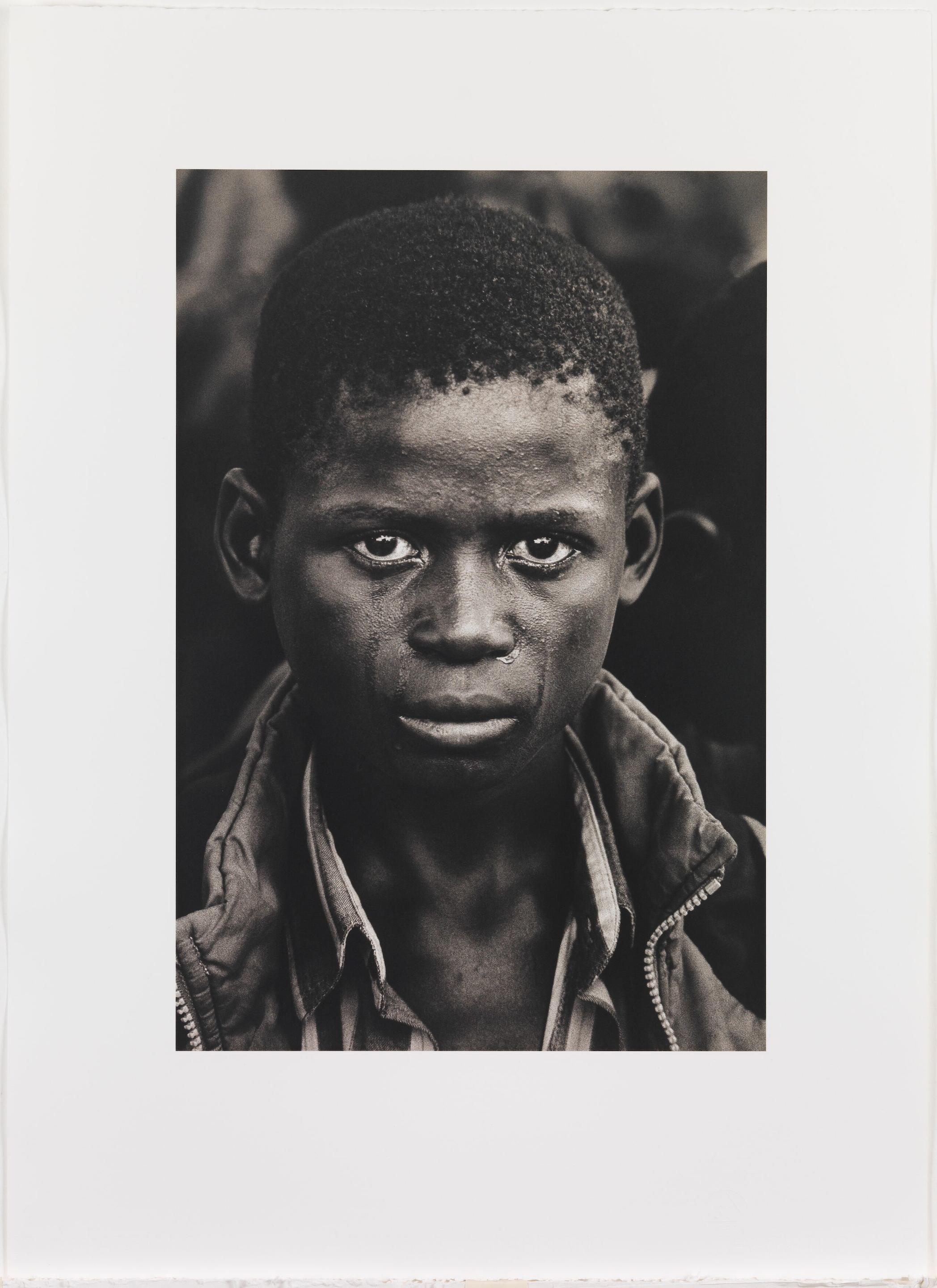 bonhams-don-mccullin-b-1935-a-15-year-old-boy-crying-at-his-father