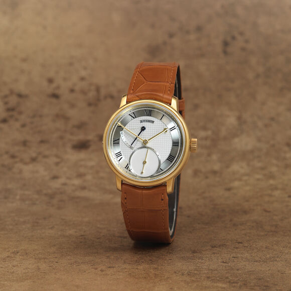 Bonhams : Roger Smith. A fine and exceptionally rare 18K gold manual wind wristwatch with power reserve indication and co-axial escapement Series 2, Commission Piece No.20-C, Purchased January 2011