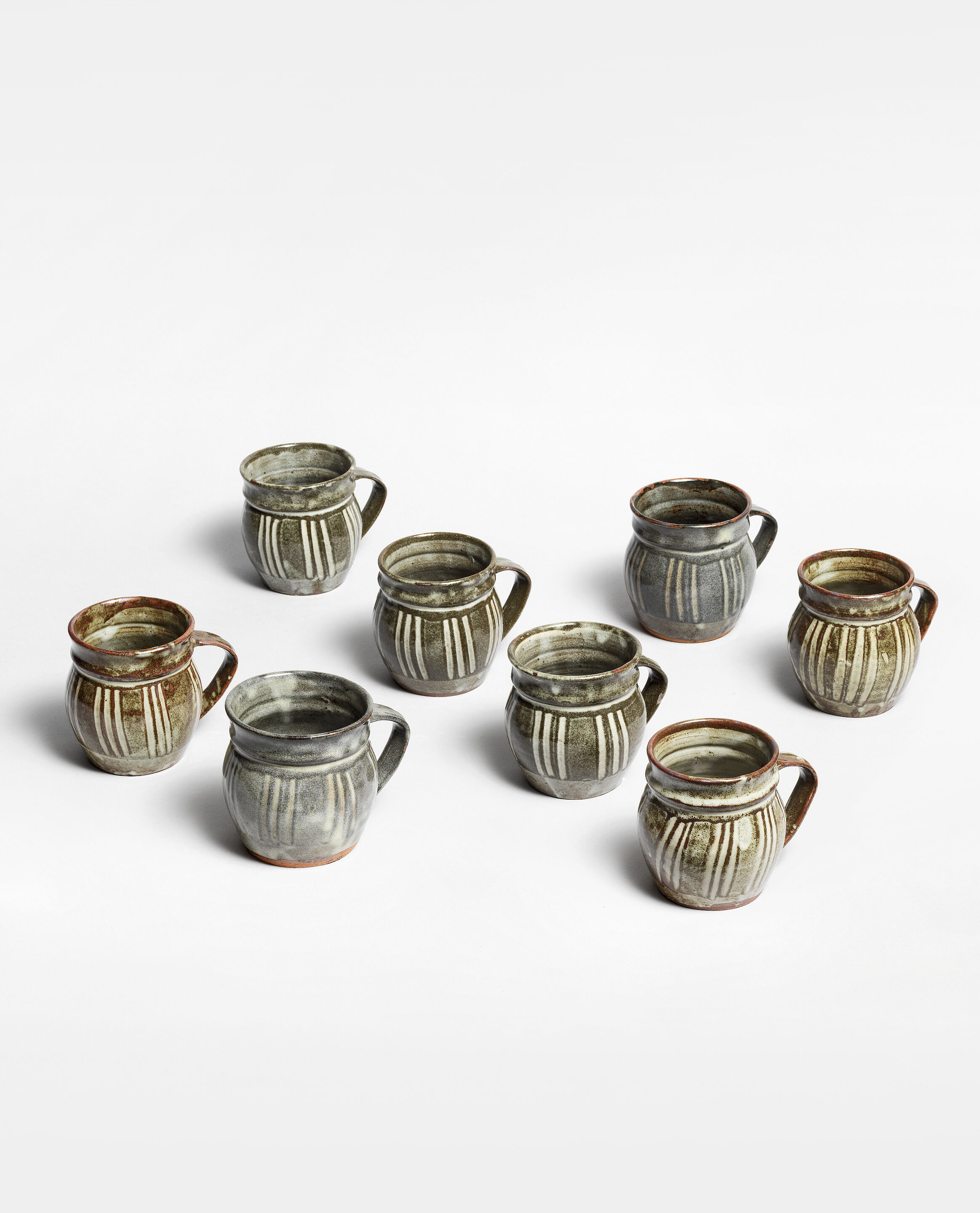 Eight Abuja Mugs