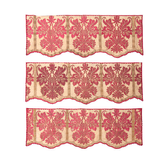 Bonhams A set of three red damask appliqué pelmets Late 17th century