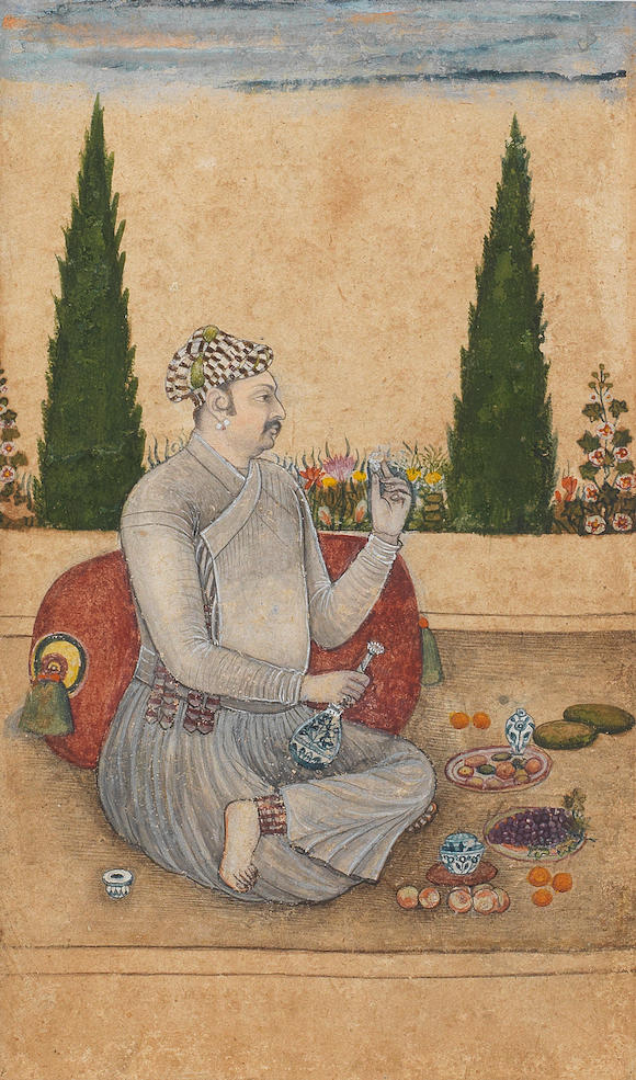 Bonhams A Nobleman Seated On A Terrace Holding A Bottle And A Cup Provincial Mughal Or