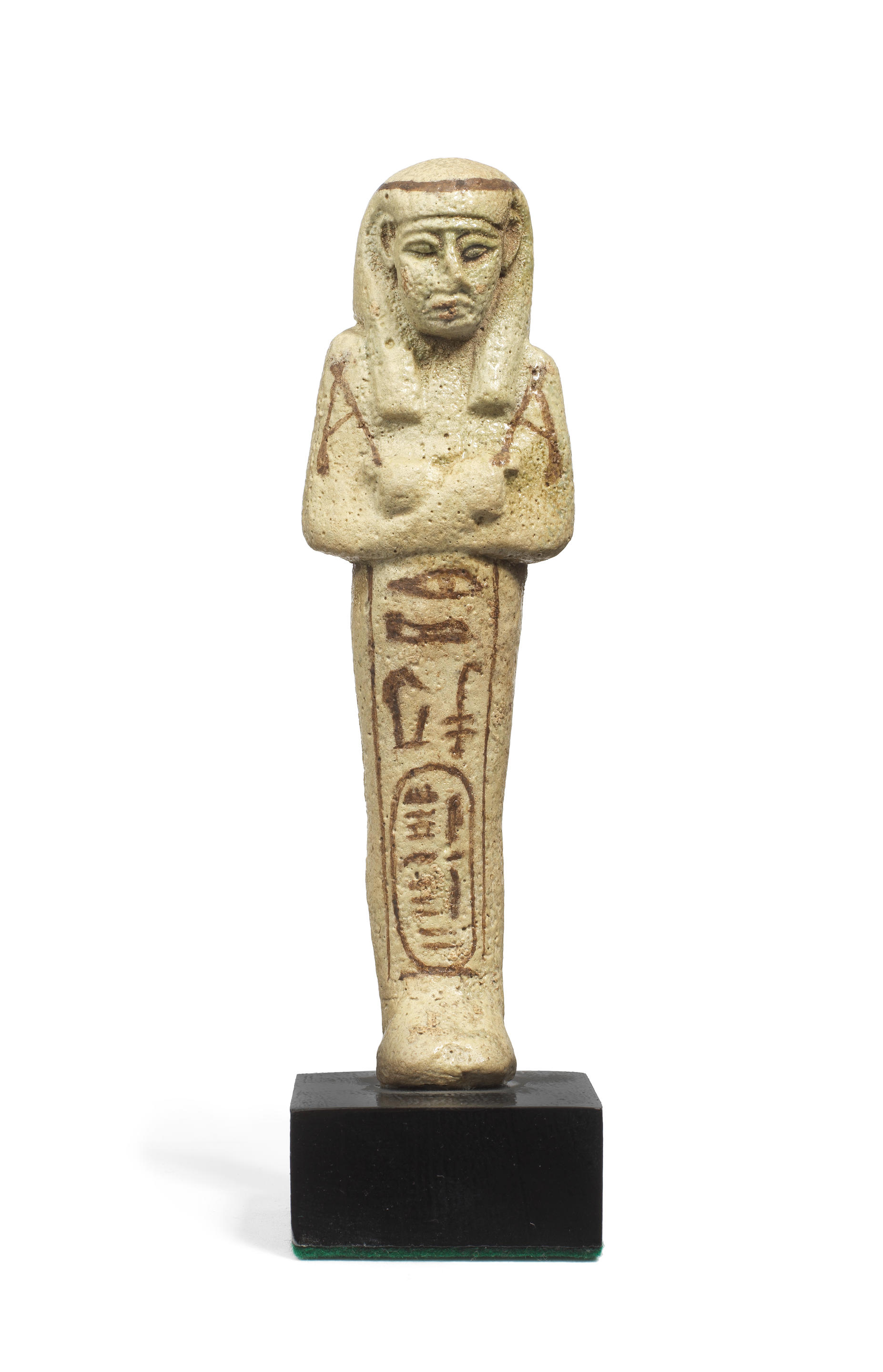 Bonhams : An Egyptian pale green glazed faience shabti for Takelot II