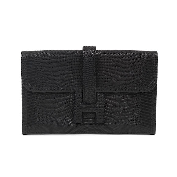 Sold at Auction: A HERMES JIGE CLUTCH BAG