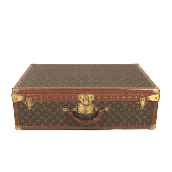 At Auction: LOUIS VUITTON case ALZER 70, act. NP.: 11.200,-.