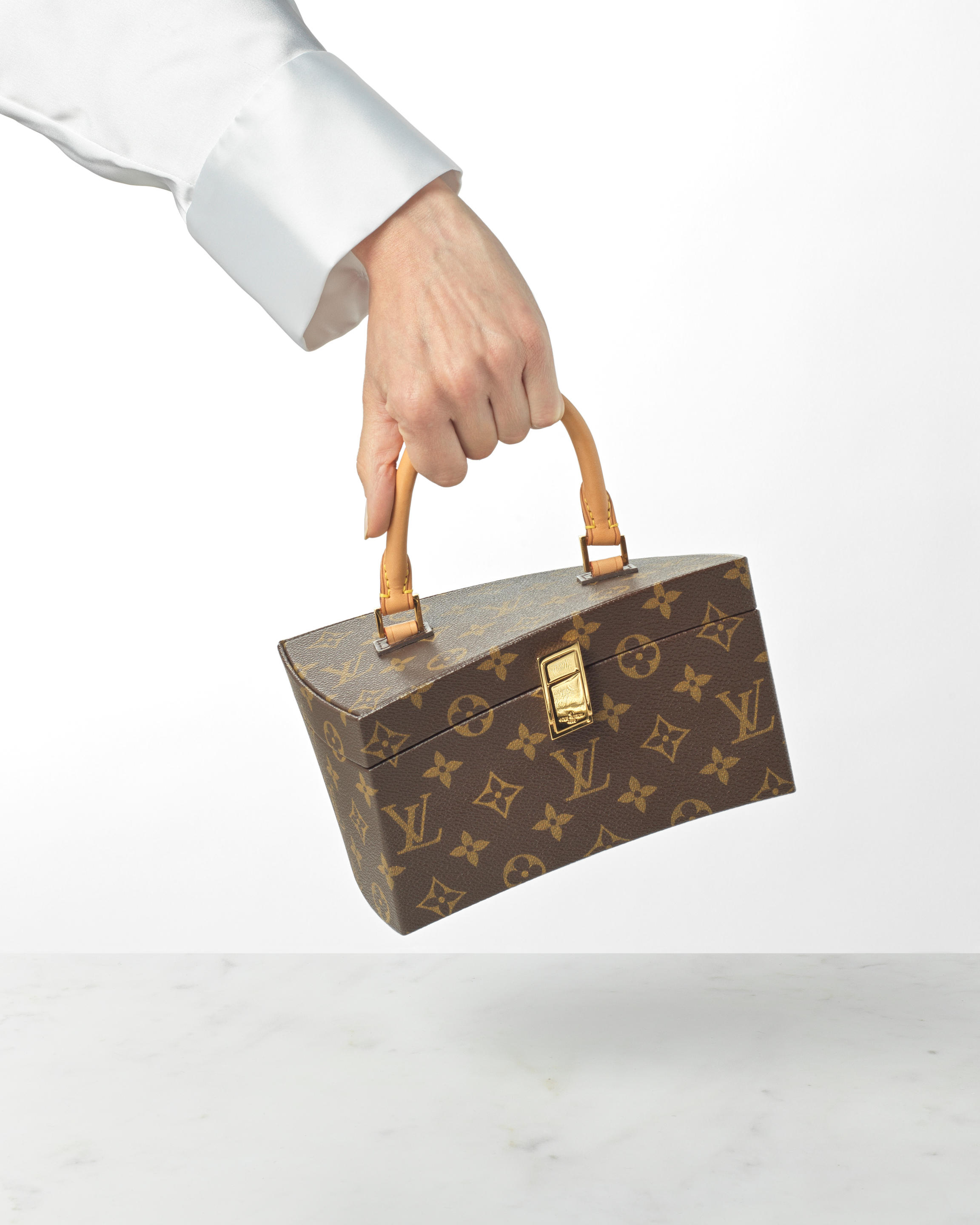 Louis Vuitton x Frank Gehry a Monogram Twisted Box Bag 2014 Iconoclasts  collection (includes shoulder strap, mirror, 'F.G' monogrammed dust bag  with luggage tag and booklets ) - Bonhams