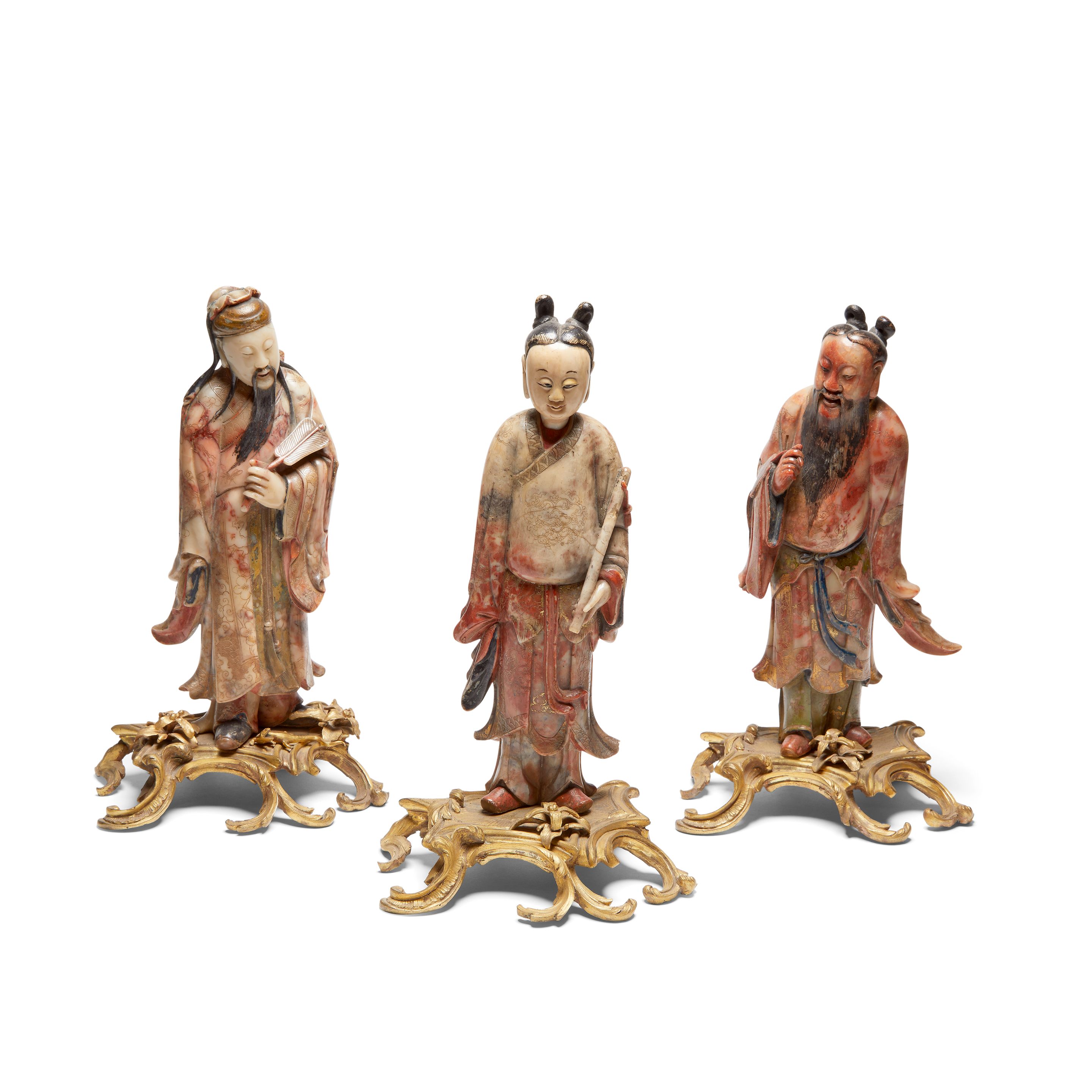 A set of three 18th century Chinese carved soapstone figures of Daoist