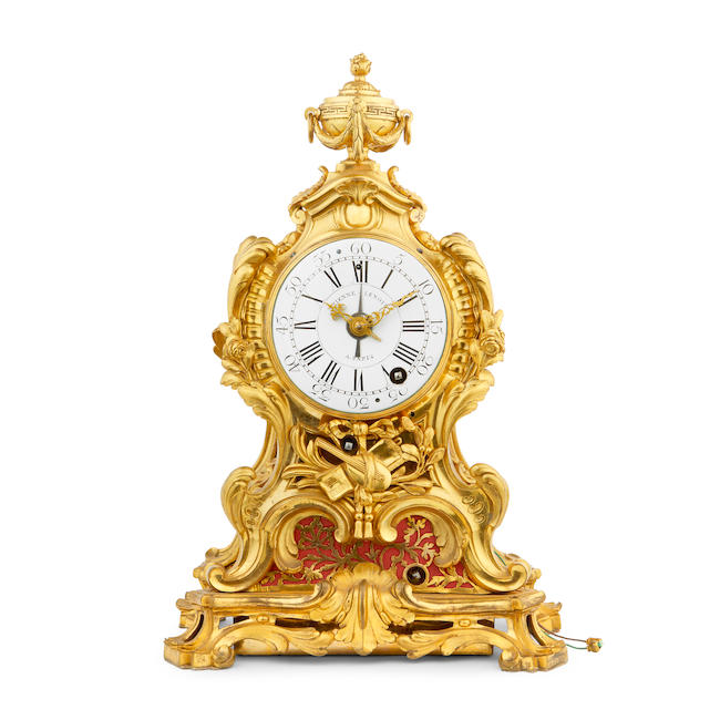 A very rare mid-18th century French ormolu grande sonnerie striking mantel clock of two-week duration, with alarm and repeat Etienne Lenoir, a Paris. The case attributed to Robert Osmond.
