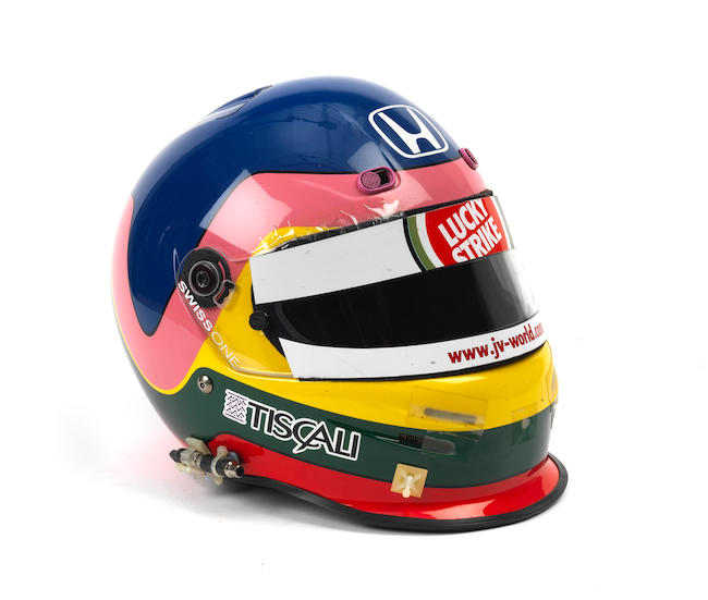 A Jacques Villeneuve helmet by Bell, used during the Austrian, Monaco & Canadian Grand Prix for BAR Honda F1, 2001, signed to the visor,