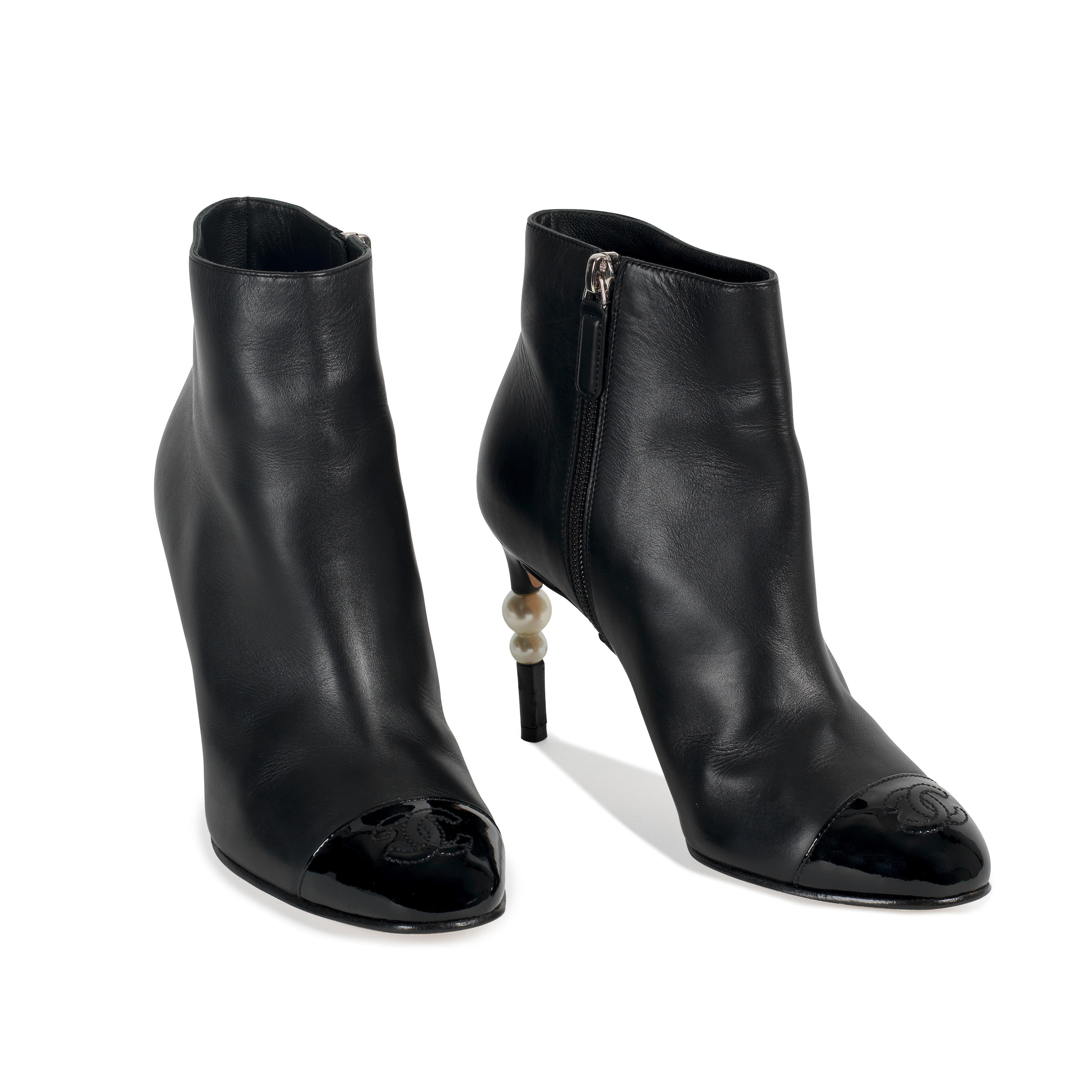 Bonhams : Virginie Viard for Chanel a Pair of Black Patent and Lambskin CC  Pearl Boots 2020 (includes dust bag)