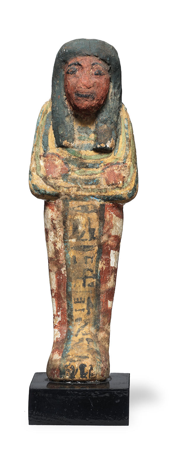 Bonhams : An Egyptian polychrome painted wood shabti for the Lady of ...