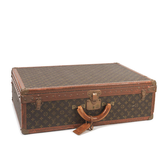 Bonhams : Louis Vuitton a Monogram Alzer 70 Suitcase c.1960 (includes  luggage tag)