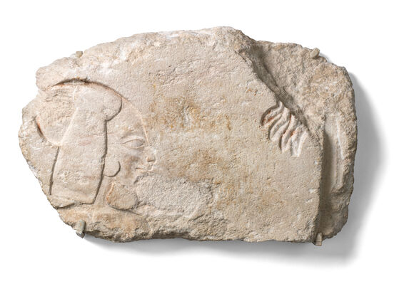 Bonhams : An Egyptian limestone relief fragment with the head of a princess