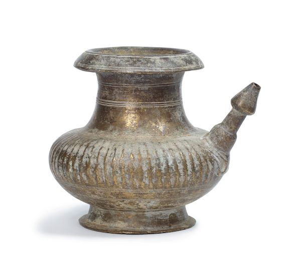 Bonhams : A brass ritual water pot (lota) North India, 17th/ 18th Century