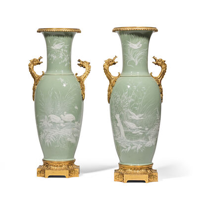 Paire de vases en porcelaine verte pâle et monture en bronzé doré, de style Louis XVI par la Maison Alphonse Giroux, Paris, vers 1860-1870A pair of Louis XVI style ormolu-mounted white-decorated pale green Paris porcelain vases by Maison Alphonse Giroux, Paris, circa 1860-1870