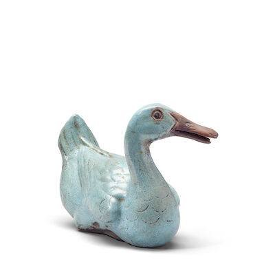 A GLAZED YIXING STONEWARE FIGURE OF A DUCK Qianlong