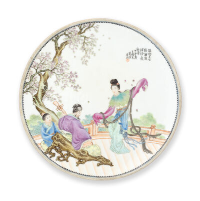 A FAMILLE ROSE CIRCULAR FIGURAL DISH Signed by Wang Longfu (1931-2015), dated Jiawu year, corresponding to 1954